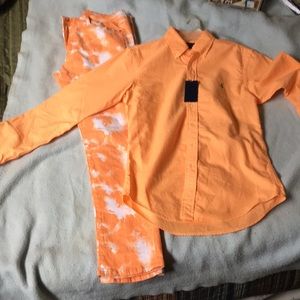 I have a size 34 pants. Never been worn. With a raph Lauren large slim fit shirt